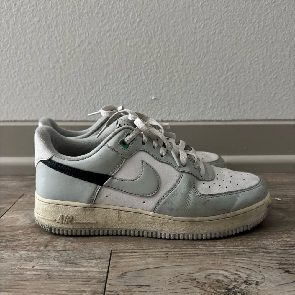 White and Gray Sneakers with Black Accent